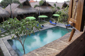 Гостиница The Calmtree Bungalows  North Kuta